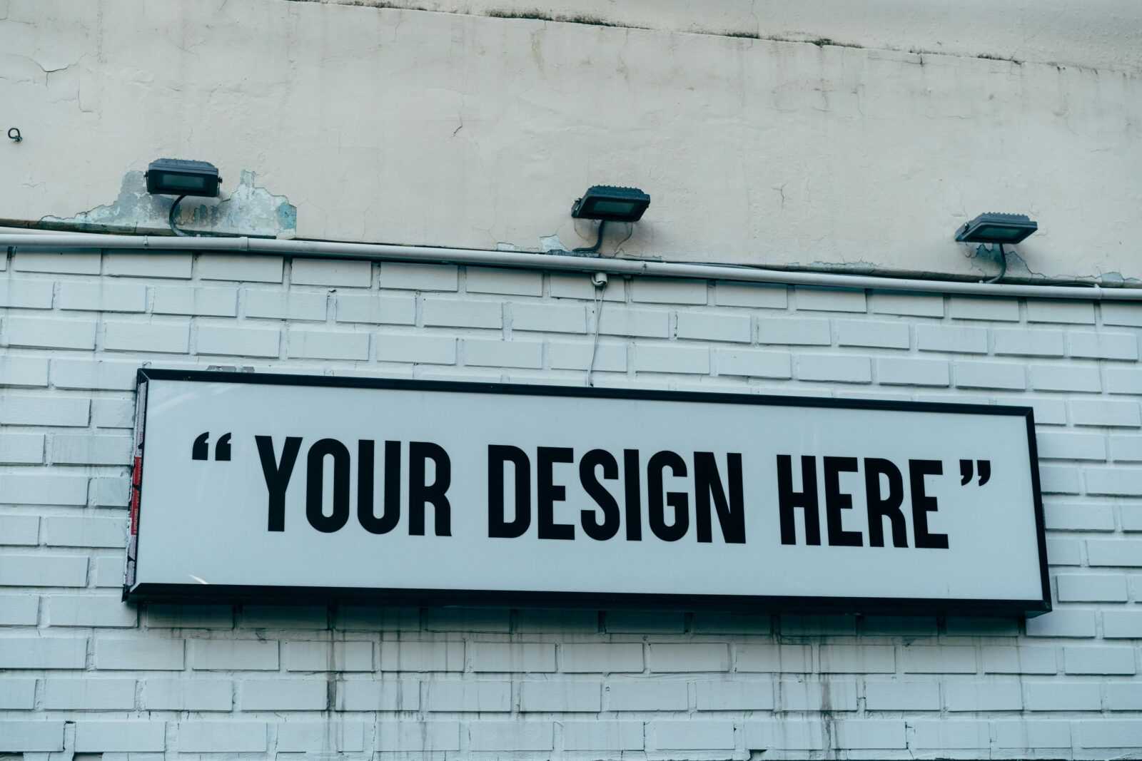 Blank urban wall sign for showcasing custom designs or messages outdoors.